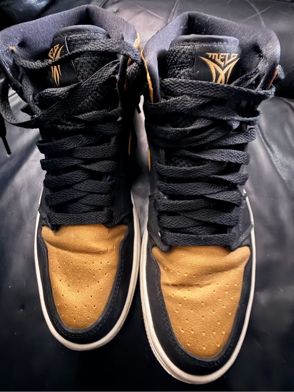 Jordan High-Top Sneakers in Black and Gold size 7.5